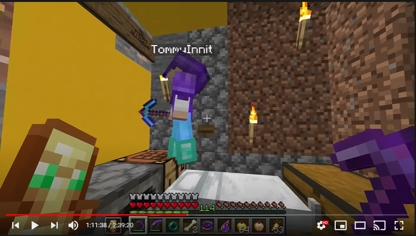 This is a screenshot of Techno's stream. He's in the hole that Tommy dug for himself in Techno's floorboards. Tommy has taken it upon himself to decorate the walls a bit with bright yellow concrete. In the small space, there is a white bed, a few chests, a crafting table, and a furnace. Tommy stands on the bed to place signs on the wall with a to-do list. From this angle, it's difficult to make out what the signs read.